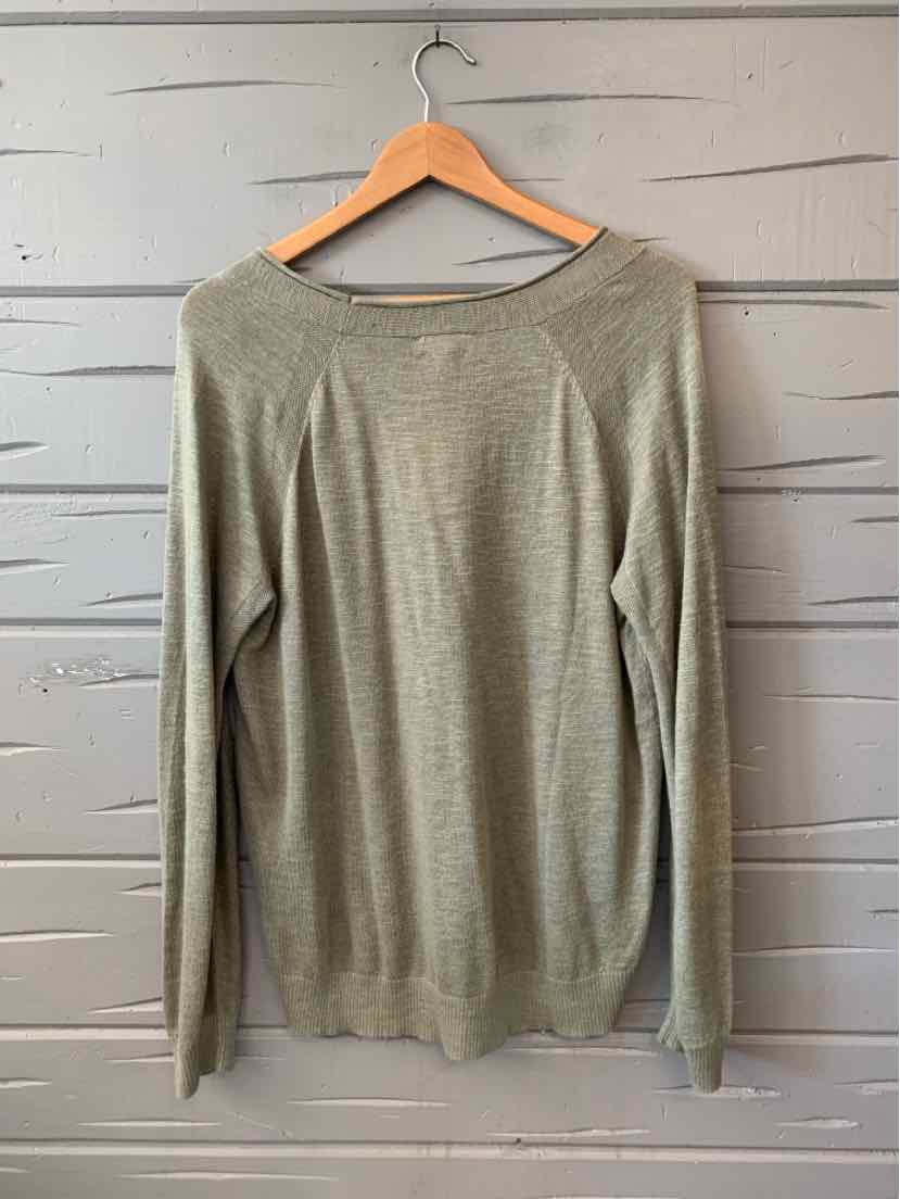Light olive green long-sleeve lightweight knit sweater in XL with crew neckline on wooden hanger.