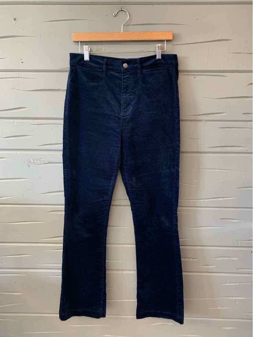 Dark navy blue straight-leg pants with front button and zip closure, hanging on wooden hanger.