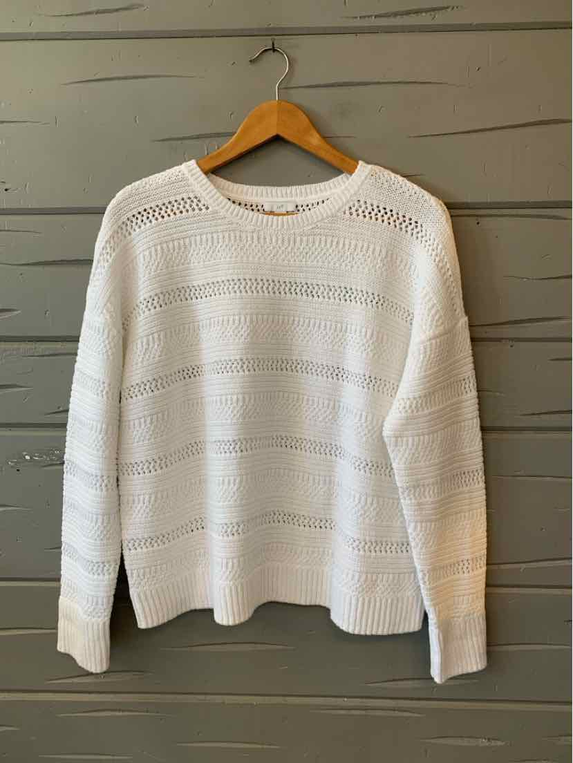 White knit long-sleeve sweater with horizontal open-knit stripes and crew neckline.
