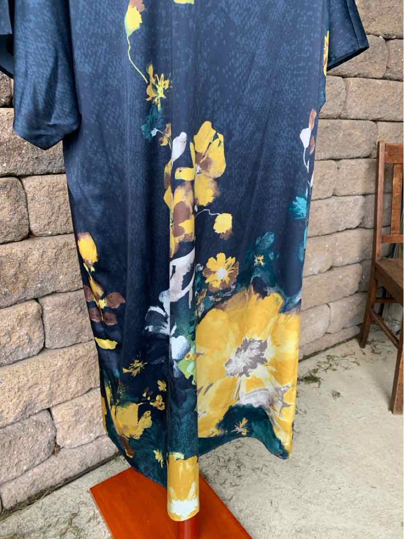 Navy blue dress with large yellow and white floral print, size XL.