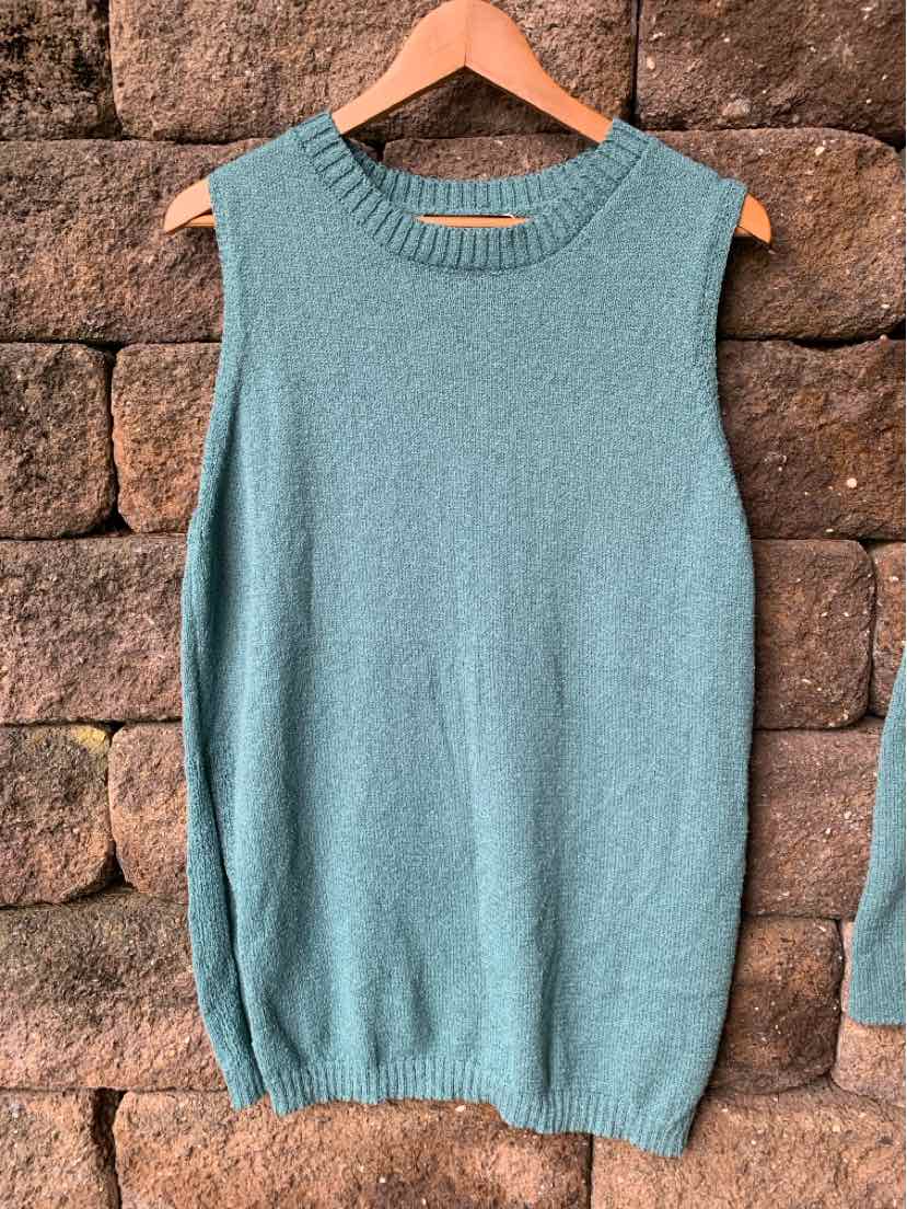 Teal sleeveless knit sweater with a ribbed crew neck and hem, displayed on a wooden hanger.