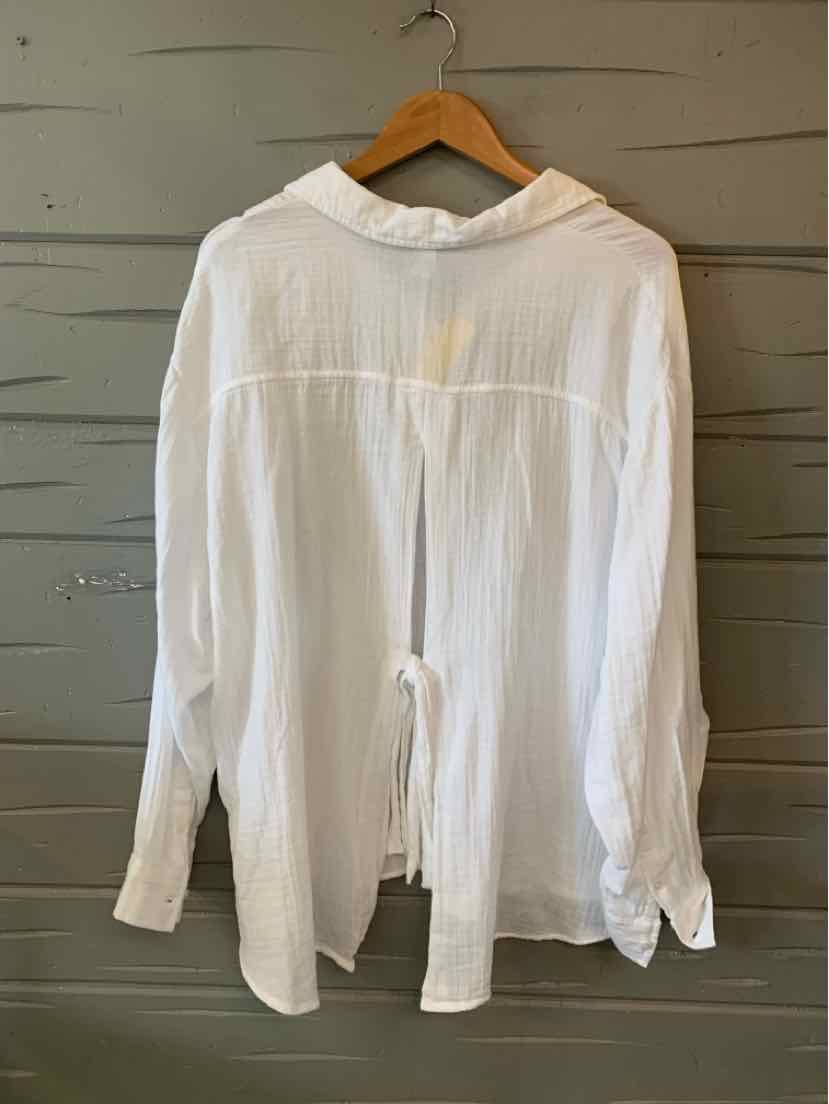 White long-sleeve blouse with collar and back tie detail, lightweight fabric, size XL.