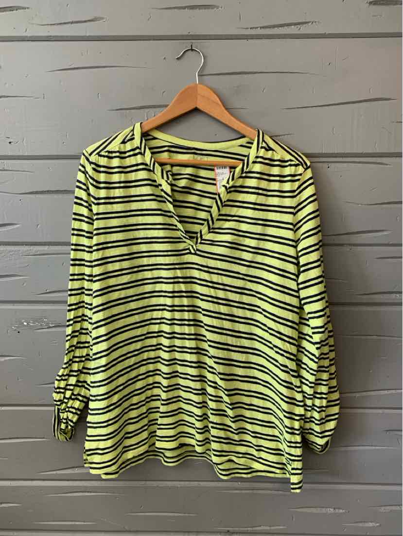 Lime green blouse with black horizontal stripes, long sleeves, and a notch neckline hanging on wooden hanger.