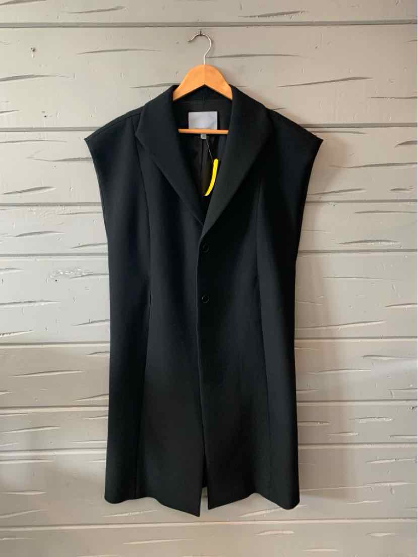 Black sleeveless long vest with wide lapels and structured shoulders on wooden hanger.