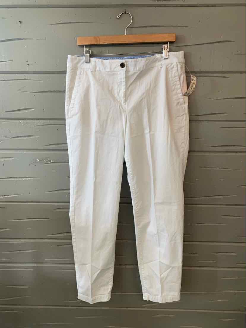 White high-waist women's pants size 10 with button and zipper front closure.