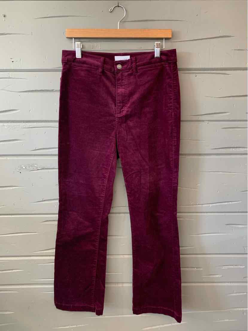 Dark plum-colored straight-leg corduroy pants with front pockets and belt loops, size 6.