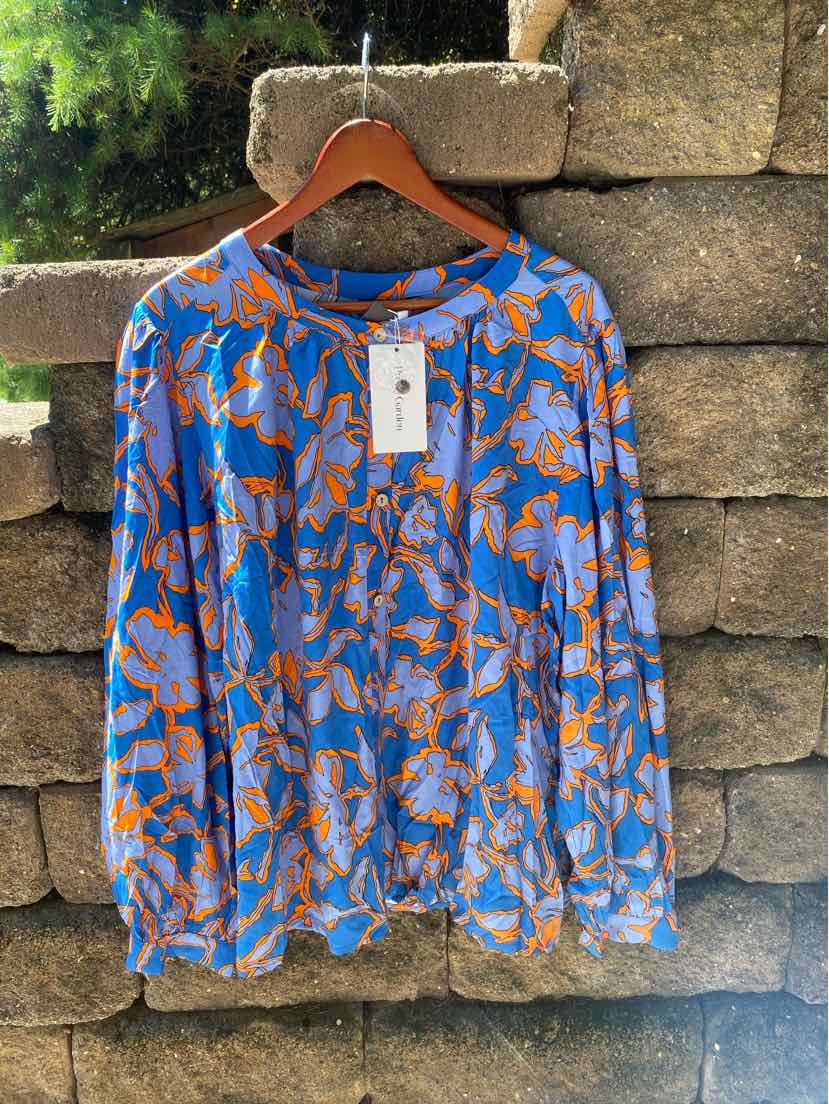 Long-sleeve blouse with blue and orange floral pattern, lightweight fabric, round neckline, size XXL.
