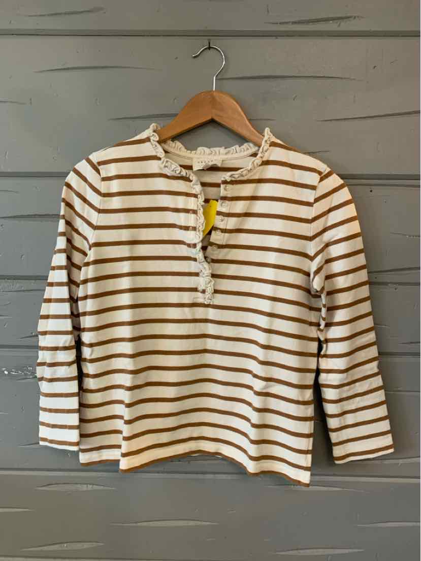 Cream and brown horizontal striped long-sleeve top with a henley neckline and button detail.