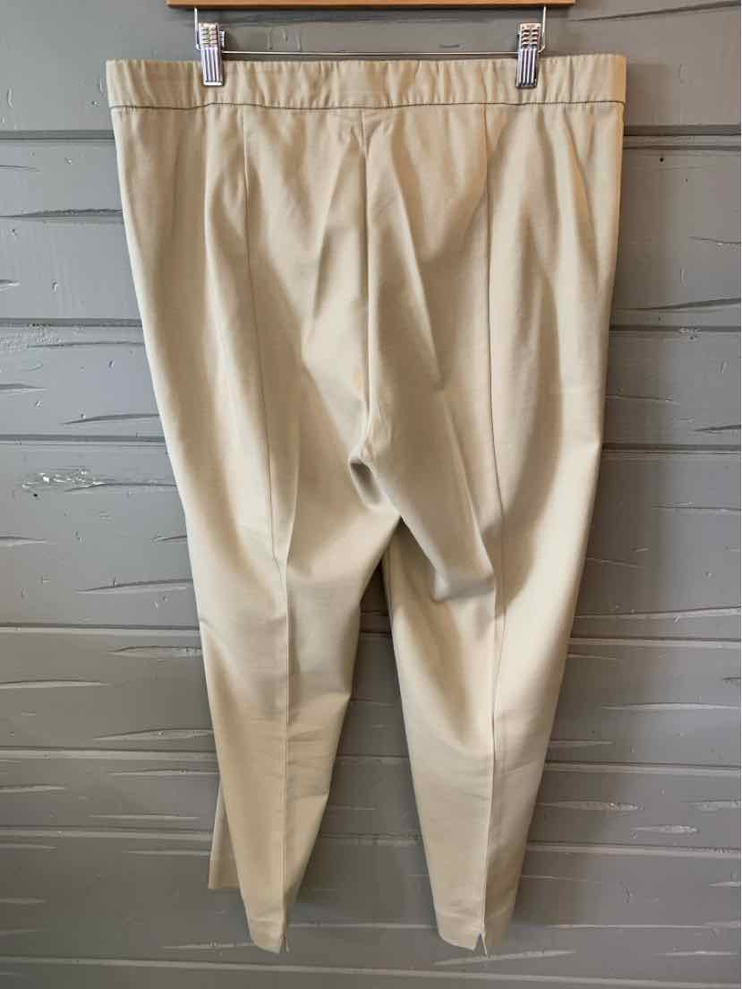 Beige straight-leg trousers with front pleats and a smooth waistband in size 16.