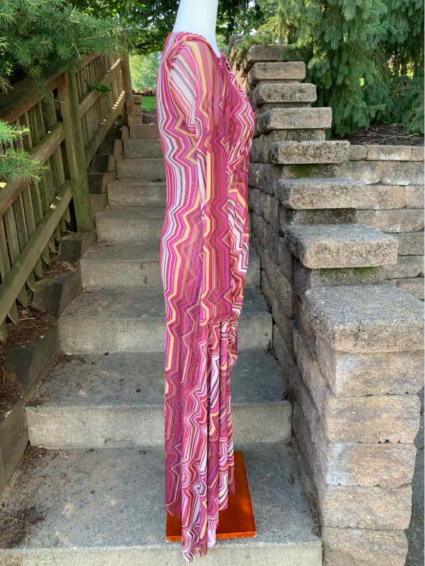 Long dress with multicolored swirling pattern in shades of pink, orange, and white, fitted silhouette, short sleeves, and.