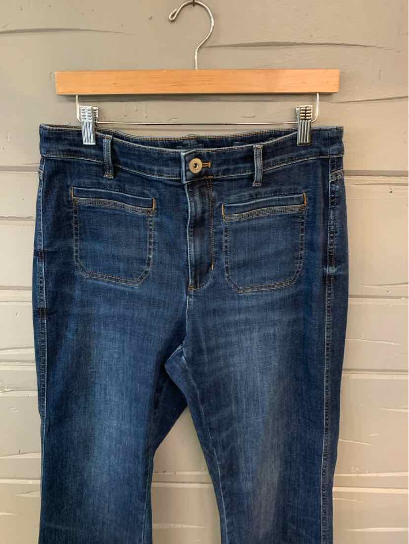 Dark blue denim jeans with front patch pockets and a button closure, size 10.