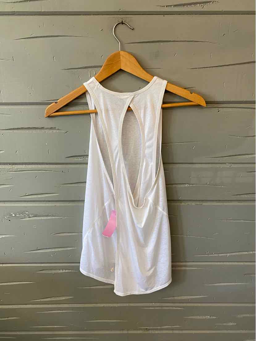 White sleeveless workout tank top with racerback and keyhole detail, lightweight fabric.