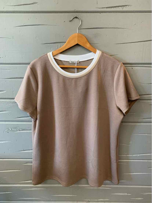 Solid beige short-sleeve T-shirt with a white-trimmed crew neckline, hanging on a wooden hanger.