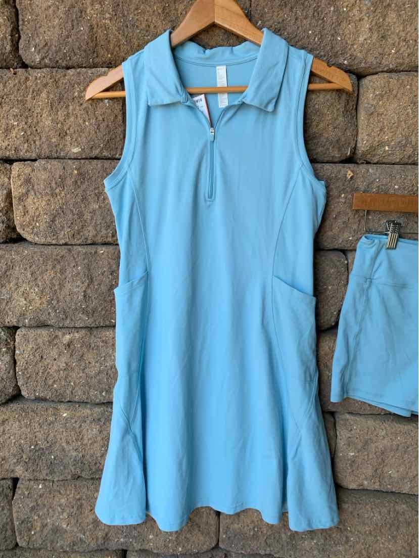 Sleeveless light blue athletic dress with a collar and front zipper, made of smooth fabric.