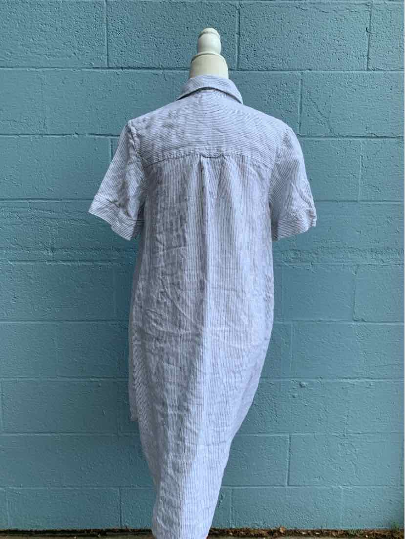 White short-sleeve linen dress with a straight cut and back yoke seam.