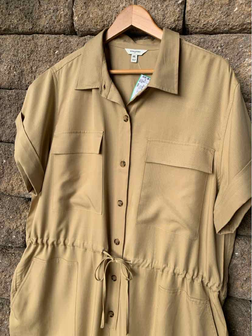 Khaki short-sleeve button-up shirt with drawstring waist and two front patch pockets.