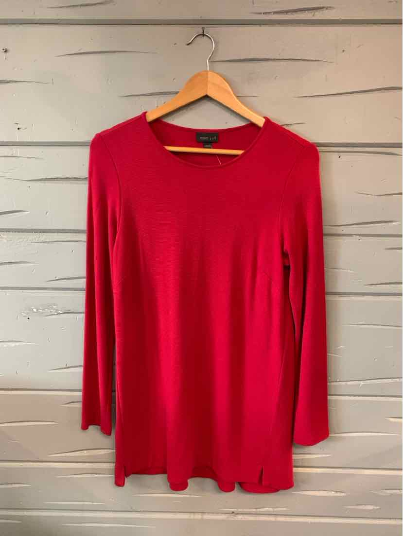 Long-sleeve solid red knit top with crew neckline on wooden hanger.