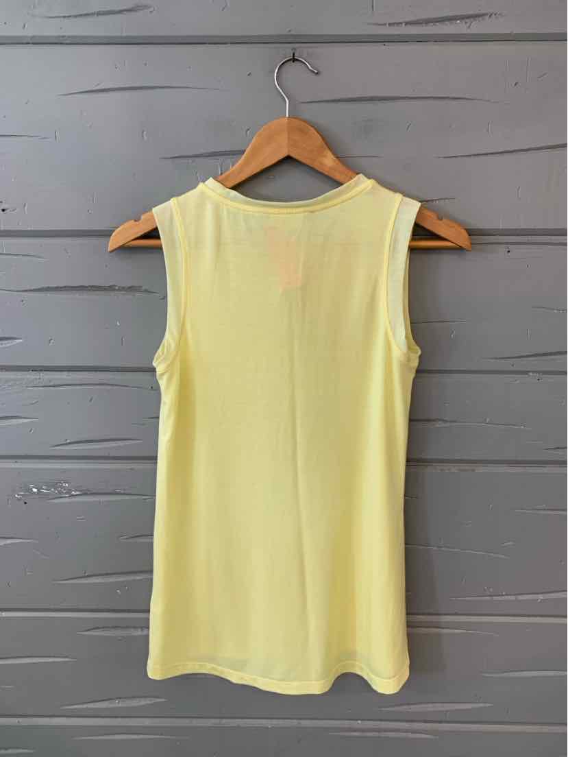 Light yellow sleeveless athletic tank top with a relaxed fit, soft fabric, and rounded neckline.