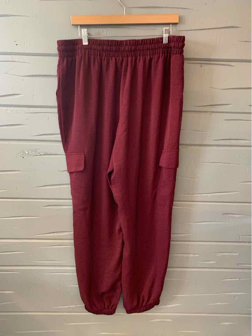 Burgundy cargo jogger pants with elastic waistband and cuffs, size XL.