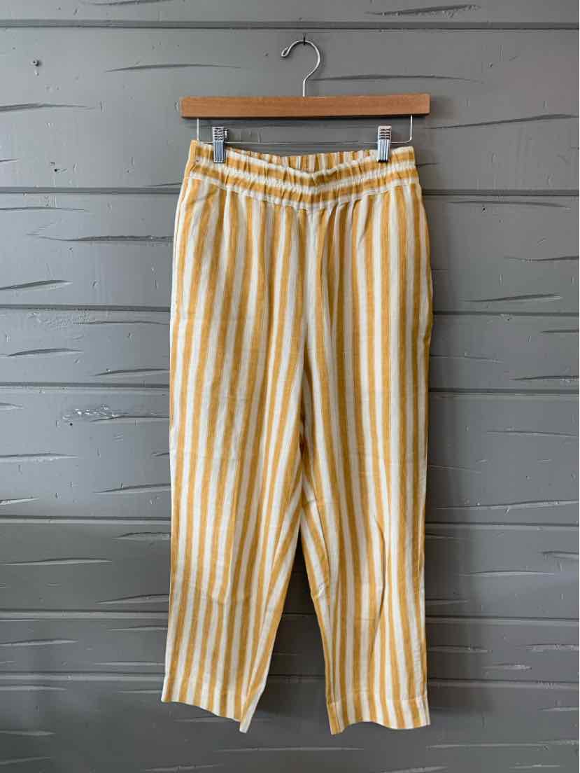 Yellow and white vertical striped high-waist wide-leg pants with belt loops and side pockets.