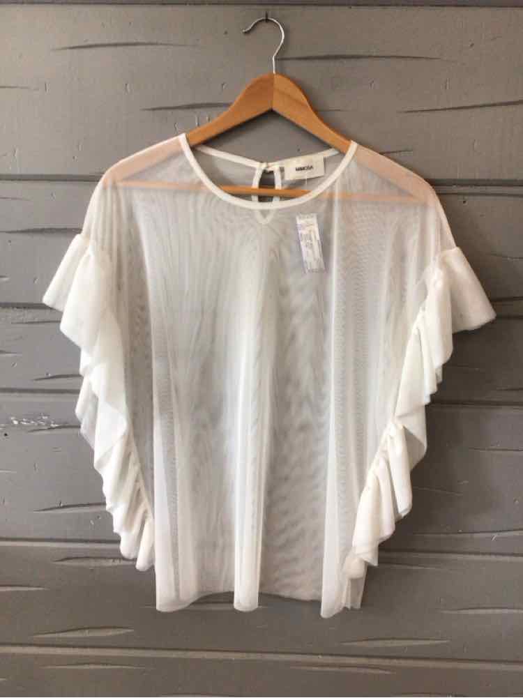 White sheer lace blouse with wide ruffled sleeves and round neckline on wooden hanger.