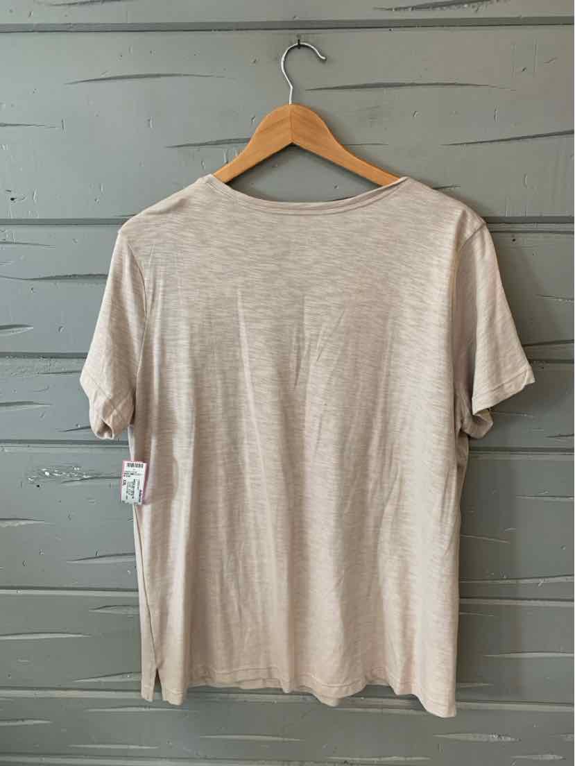 Beige short-sleeve T-shirt in size XXL, hanging on wooden hanger against gray wooden wall.