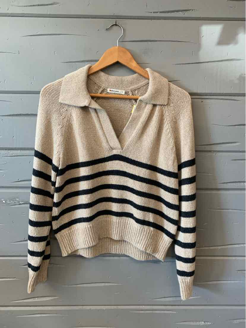 Beige knit sweater with black horizontal stripes, collar, and V-neck detail, size small.