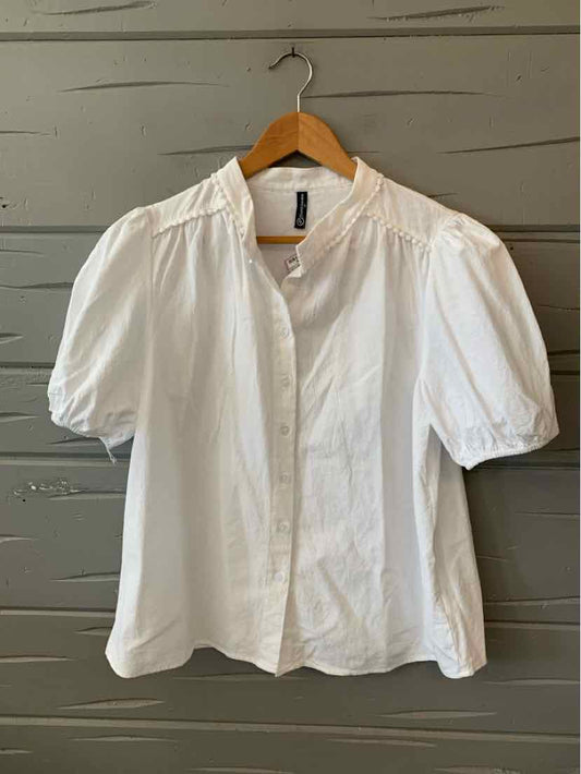 White blouse with short puff sleeves, gathered neckline, and button-down front in medium size.