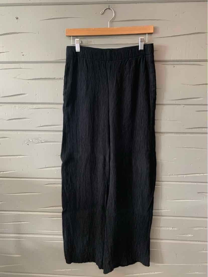 Black wide-leg pants with high waist and subtle texture, size small.