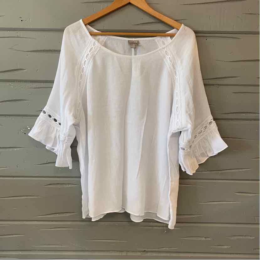 White blouse with scoop neckline and 3/4 sleeves featuring ruffle and lace trim detail.