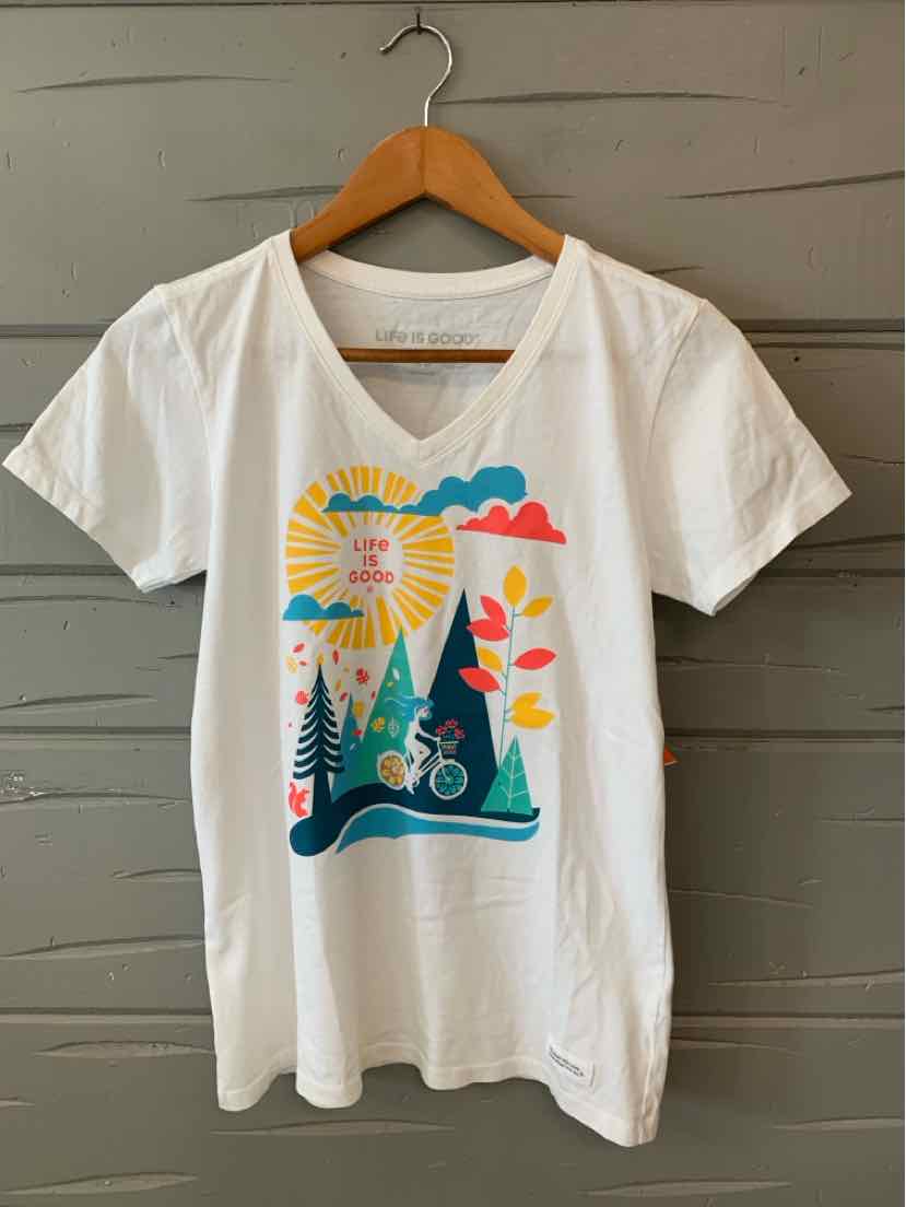 White V-neck T-shirt with colorful outdoor graphic featuring sun, trees, bike, and clouds.