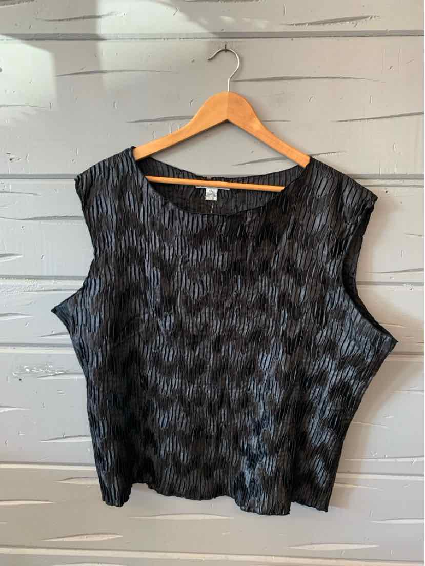 Black sleeveless top with subtle textured pattern and wide scoop neckline on wooden hanger.
