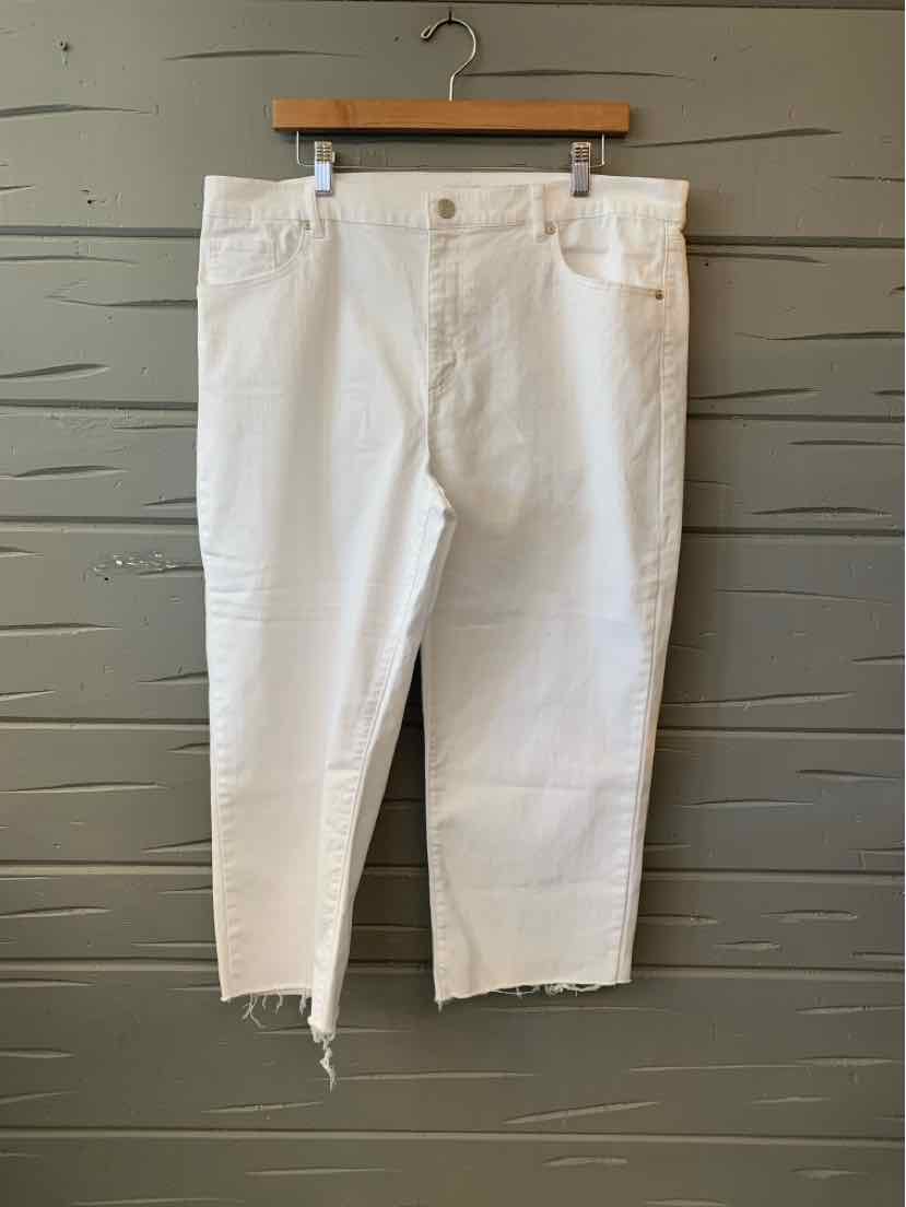 White cropped jeans with raw hem, mid-rise waist, and classic five-pocket design.