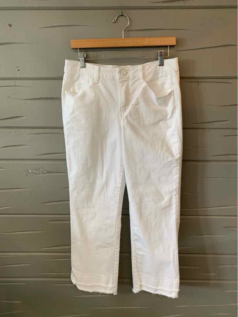 White denim jeans in size 8 with front pockets and belt loops hanging on a wooden hanger.