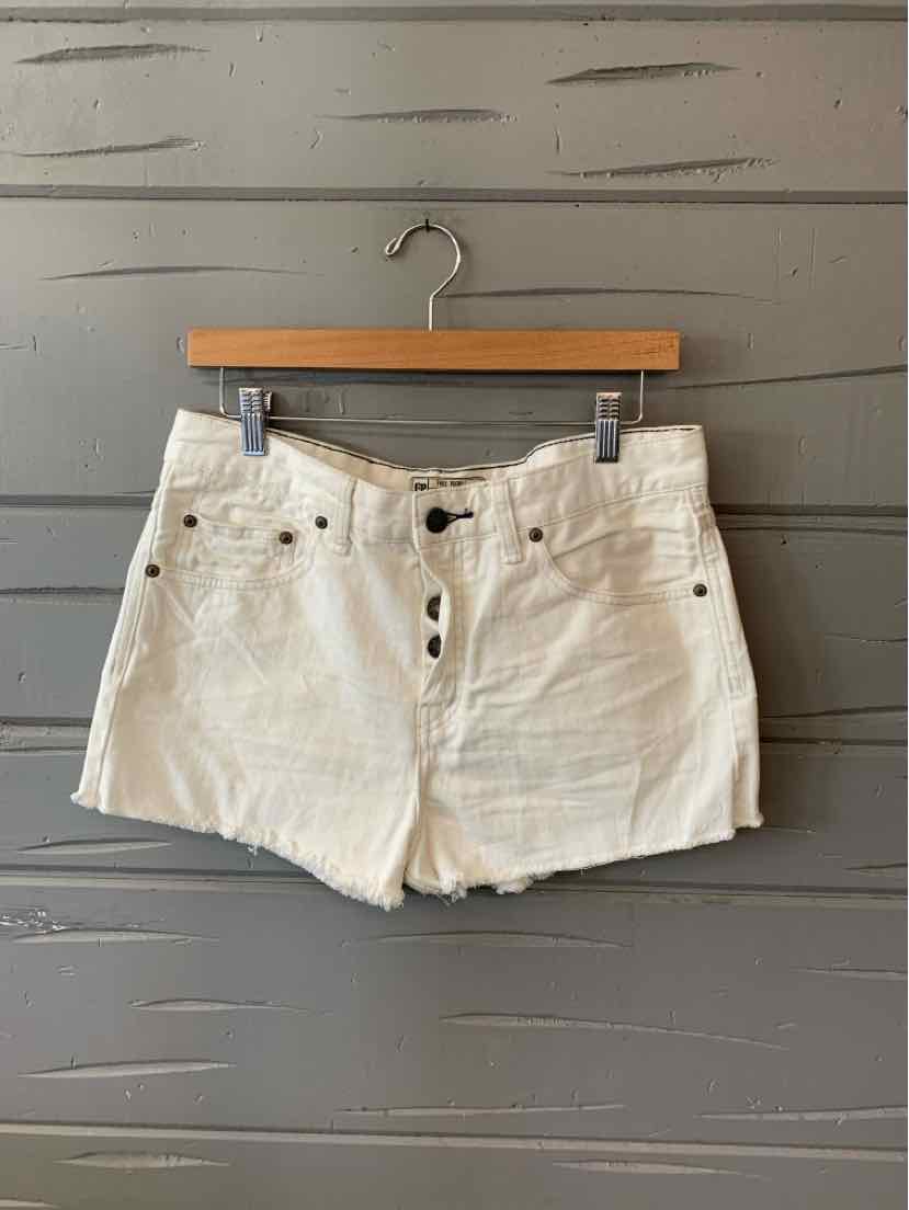 White high-waisted denim shorts with front button closure and belt loops, size 8.