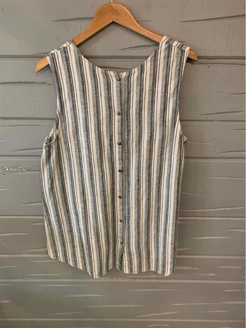 Sleeveless striped blouse in white, navy, and beige with front button details on wooden hanger.