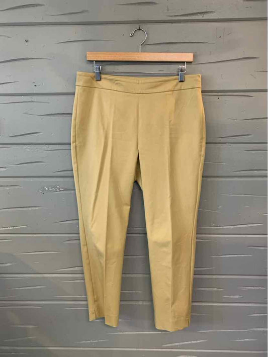 High-waisted tan tapered trousers with front pleats and side pockets, size 10P.