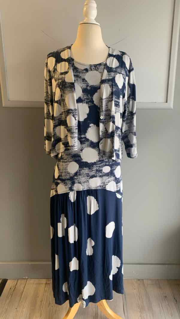Navy blue two-piece set with white abstract dot print, loose-fitting top and matching skirt XL.