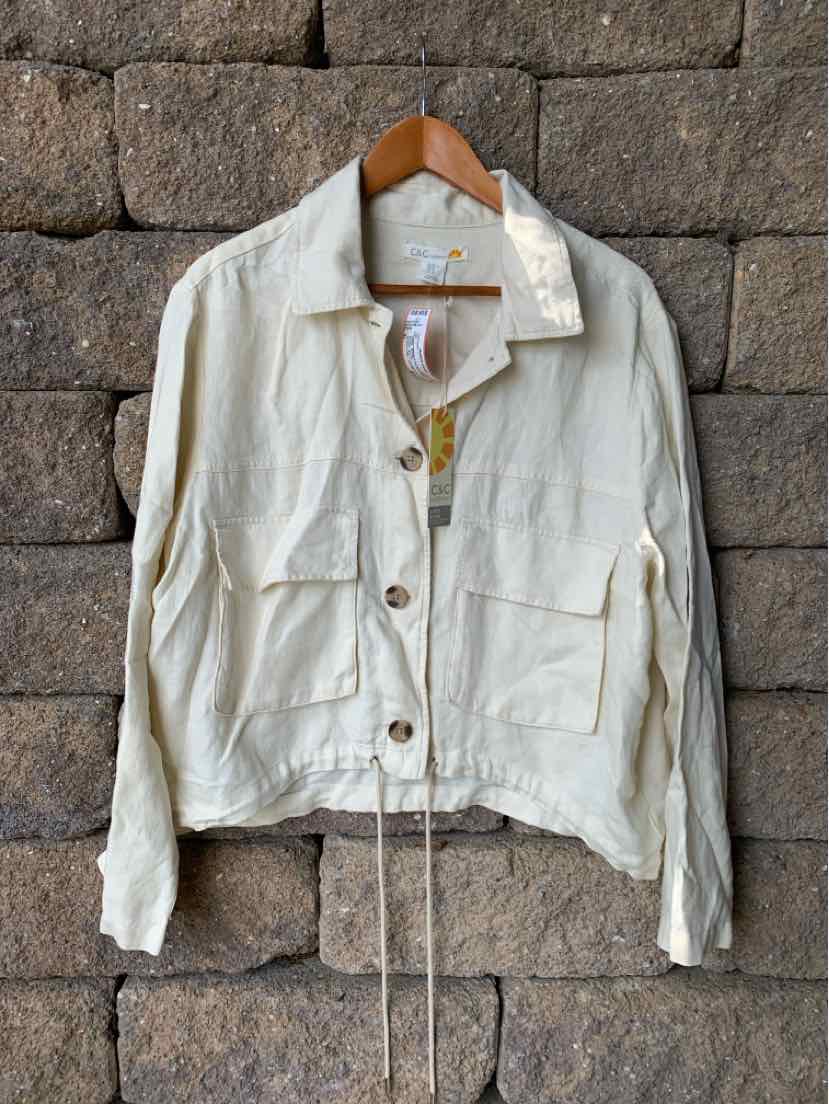 Off-white long-sleeve jacket with button front, two large chest pockets, and adjustable drawstring hem.