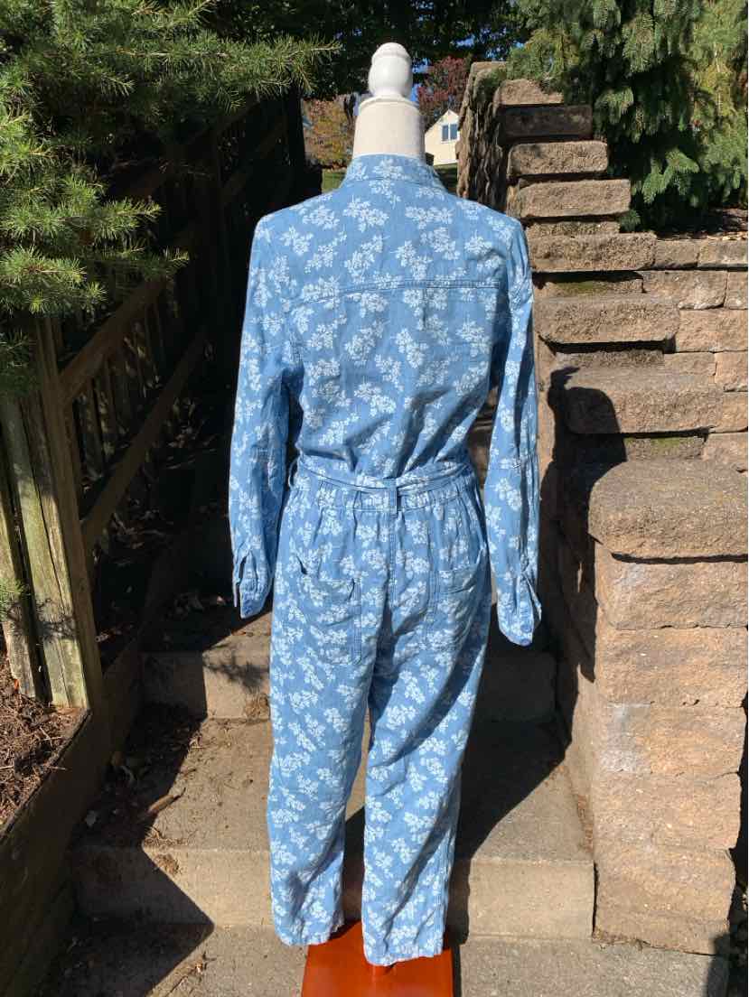 Light blue Old Navy floral-print long-sleeve jumpsuit with a fitted waist and tapered legs.