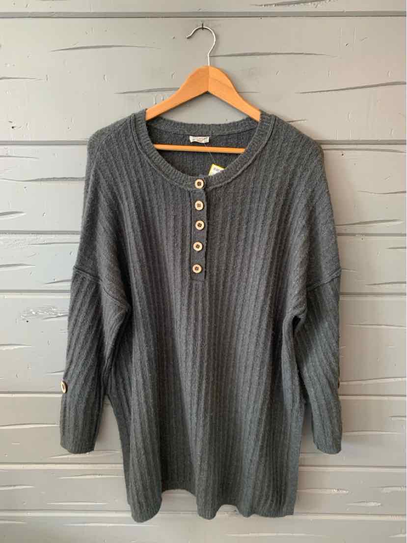 Gray ribbed knit long-sleeve henley sweater with button placket and relaxed fit.