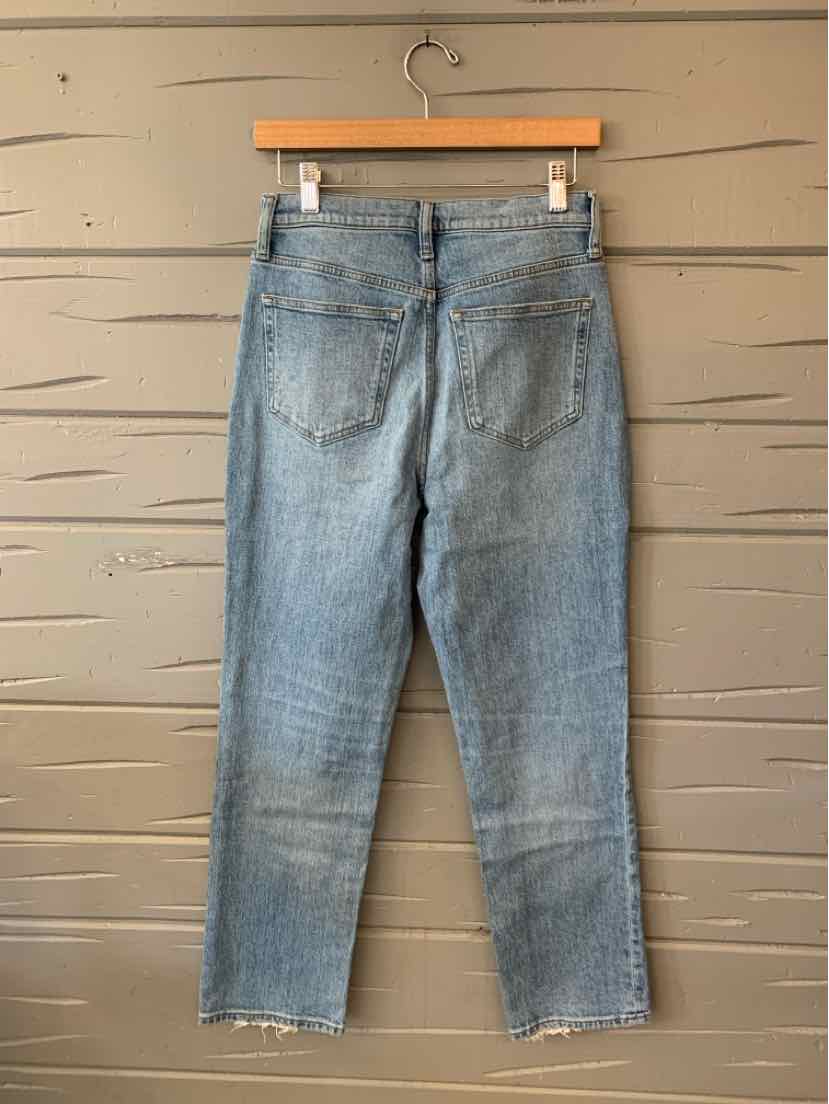 Light-wash blue J.Crew denim jeans with a straight-leg cut, button closure, and five-pocket styling.