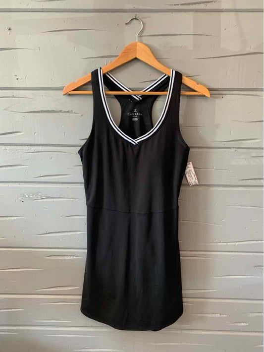 Black athletic sleeveless dress with white trim and racerback design on wooden hanger.