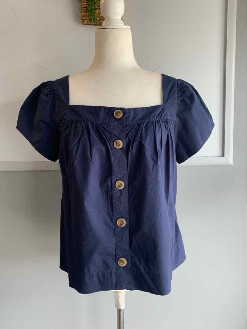 Navy blue short-sleeve blouse with square neckline and front wooden buttons.