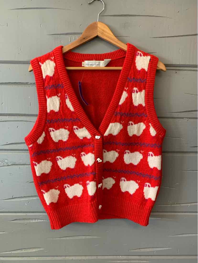 Red sleeveless V-neck knit vest with white sheep motifs, button front, and ribbed trim.