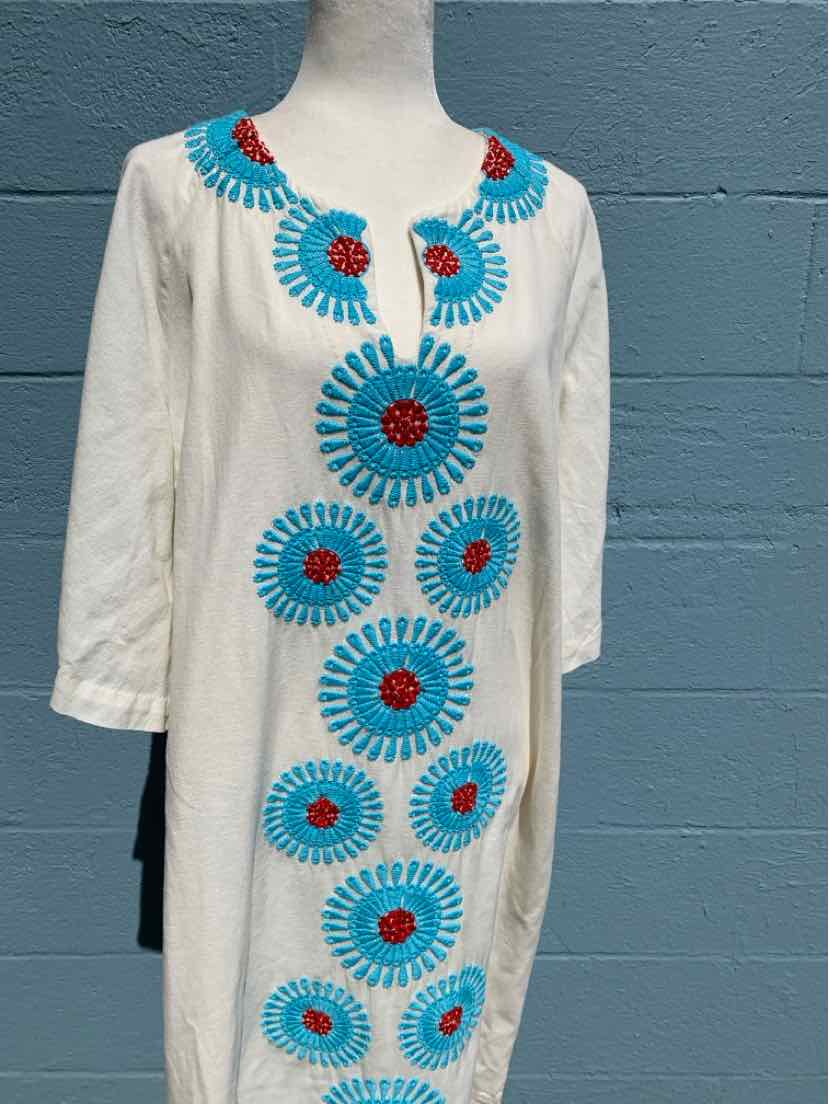 White long-sleeve dress with blue and red circular embroidery down the front and around the neckline, size XL.