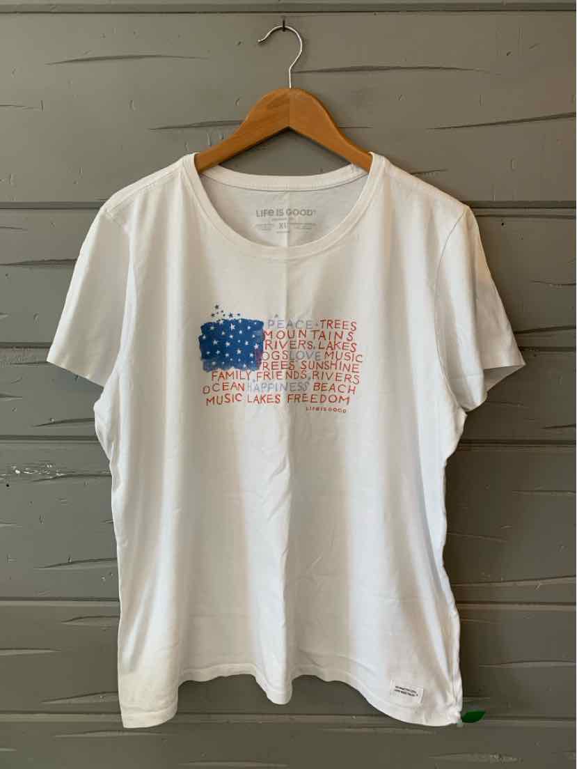 White cotton short-sleeve T-shirt with a blue and red American flag graphic on the chest, size XL.