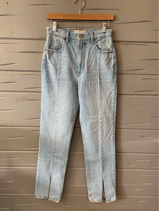 Light blue high-waisted denim jeans with a straight leg and five-pocket design.