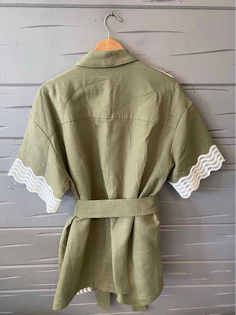 Olive green short-sleeve jacket with white wave trim on sleeves and a fabric belt at the waist.