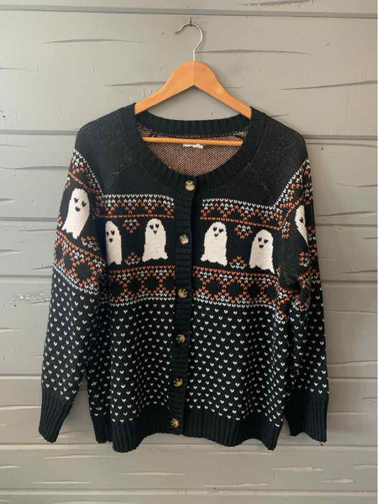 Black long-sleeve cardigan with button closure, featuring white ghost patterns and orange decorative stripes.